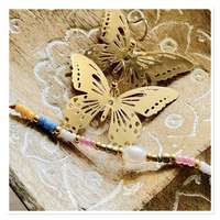 Gouden vlinder oorbellen